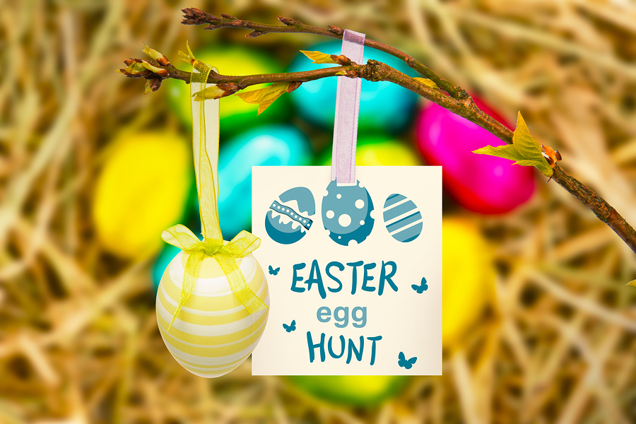 easter egg hunt graphic against easter eggs grouped together on straw
